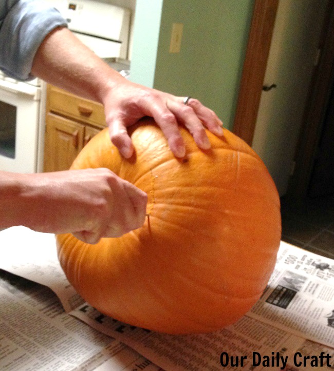 cutting pumpkin bottom