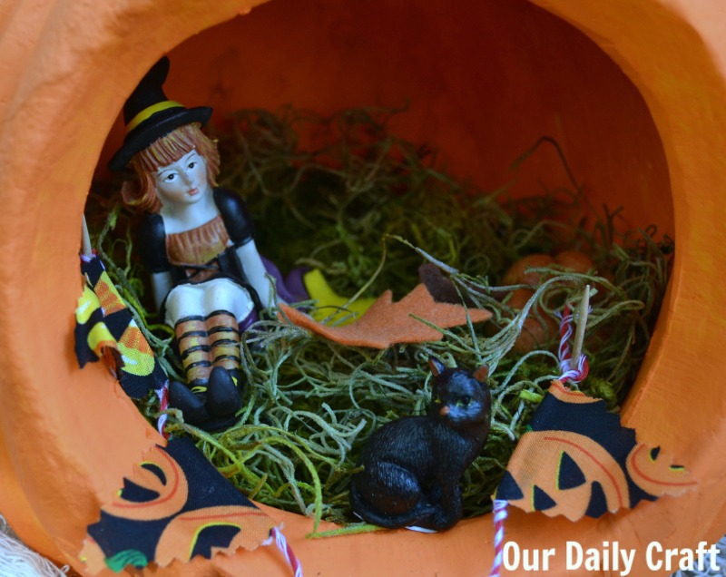 Make a Halloween fairy garden centerpiece for your table.