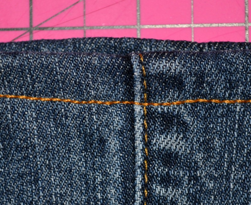 How to sew a new hem on your jeans when you tear them up by walking on them because they are too long.