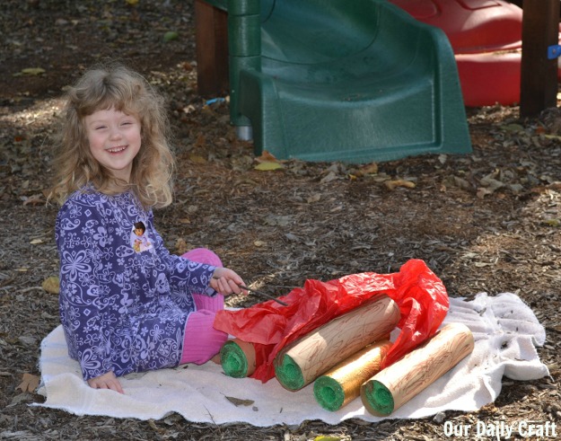 playing with a campfire play set