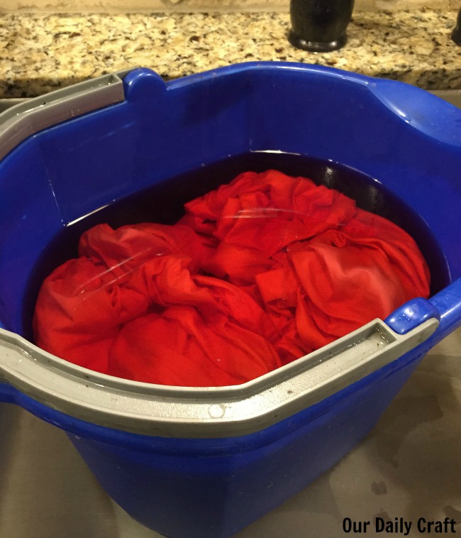 fabric in dye bath bucket