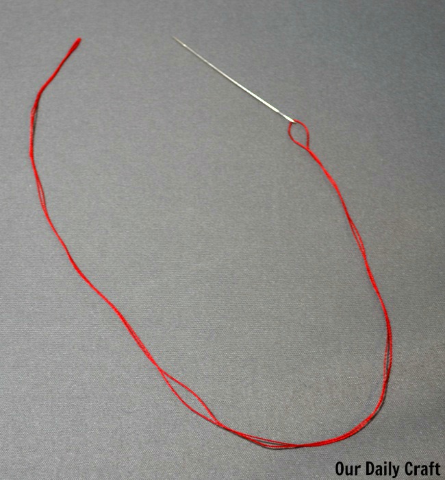 threaded needle for hand sewing