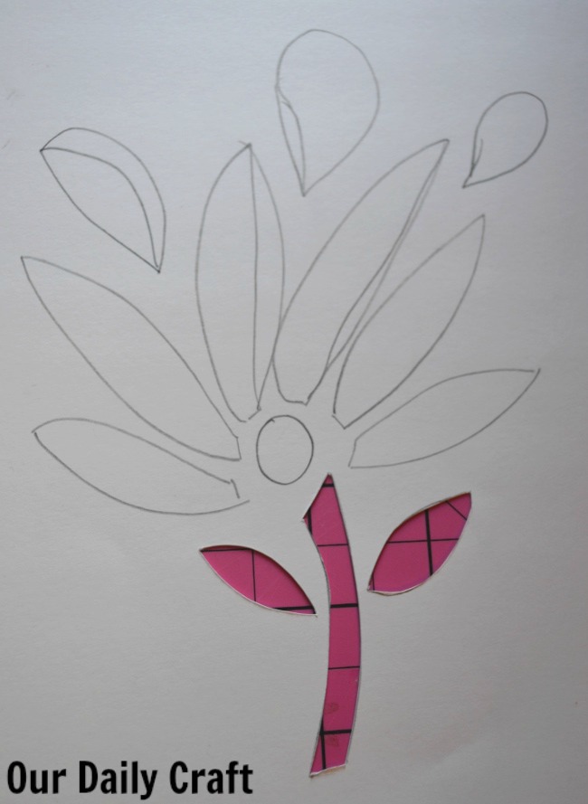 cutting out cut paper flower