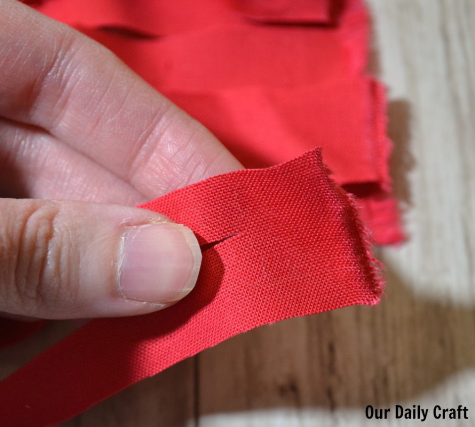 cutting strips to make fabric yarn